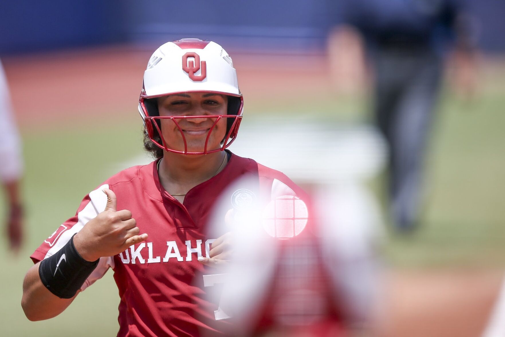 Jocelyn Alo rounds the bases after hitting a home run